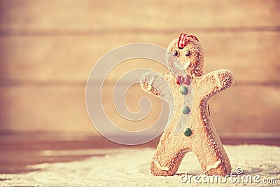 Cookie men on wooden table.