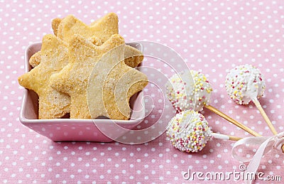 Cookies in star shape and white cake pops