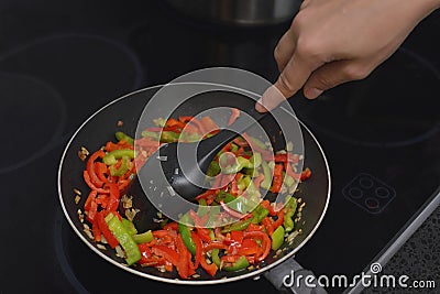 Cooking vegetables in a pan