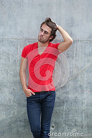 Cool guy posing with hand in hair