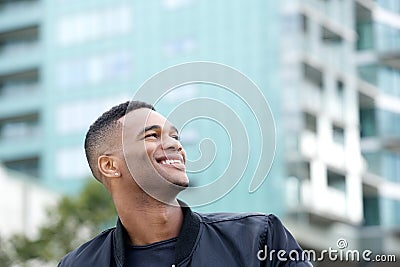 Cool guy smiling outdoors