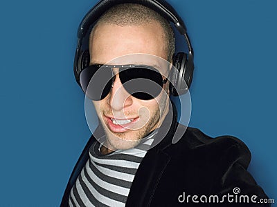 Cool Man Wearing Headphones And Sunglasses