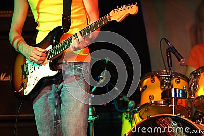 Cool rocker playing guitar