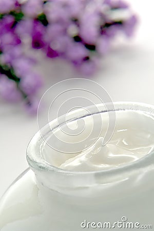 Cosmetic Facial Care Cream in a Glass Jar in a Spa