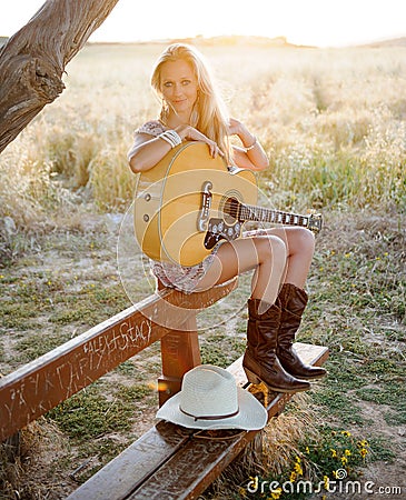 Country girl and guitar