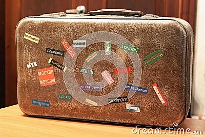 Country tag stickers on a travel suitcase