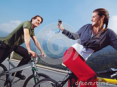 Couple on bicycles in the park