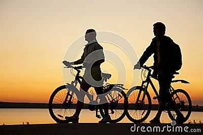 Couple of bicycles on sunset