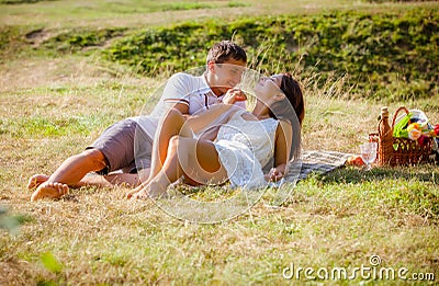 Couple celebrating together at picnic