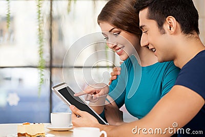 Couple with digital tablet.