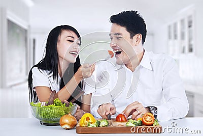 Couple eating salad