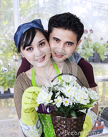 Couple holding flowers