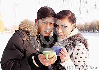 Couple with a hot drink
