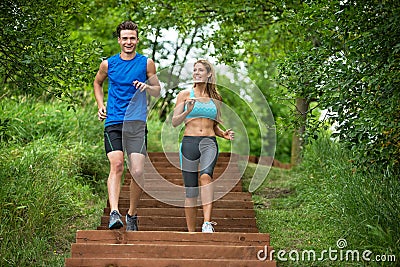 Couple Jogging In Park