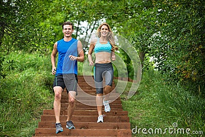 Couple Jogging On Staircase