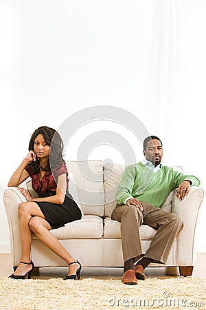 http://thumbs.dreamstime.com/x/couple-man-woman-sit-apart-couch-extensive-series-young-african-american-having-romantic-dinner-47315131.jpg