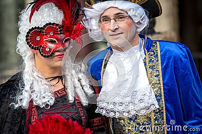 Couple in masks on Venetian carnival 2014, Venice, Italy