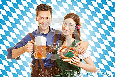 Couple at Oktoberfest with beer