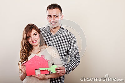 http://thumbs.dreamstime.com/x/couple-paper-house-housing-real-estate-smiling-young-holding-key-husband-wife-dreaming-new-home-concept-57150470.jpg