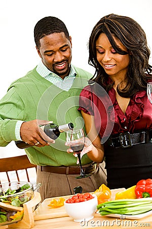 Couple: Pouring a Glass of Wine