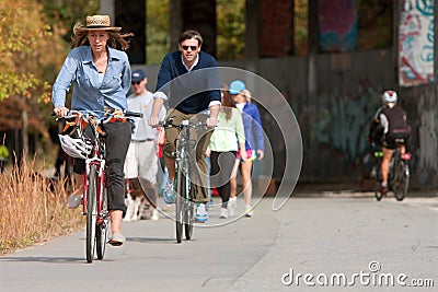 Couple Rides Bikes Along Urban Development Trail In Atlanta