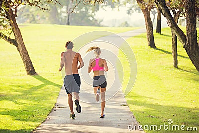 Couple running in park