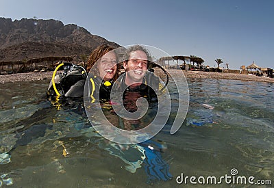 Couple scuba diving