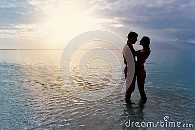Couple silhouette beach