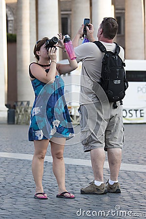 Couple turist taking a souvenir snapshot