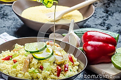 Couscous with grilled chicken meat and vegetables