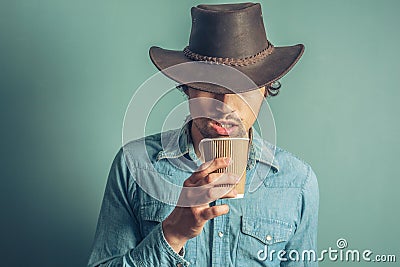 Cowboy drinking coffee