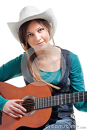 Cowgirl in ahat with acoustic guitar