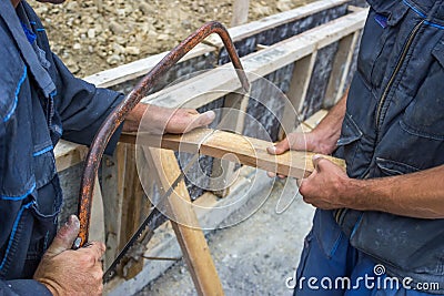 Craftsman cutting wood board