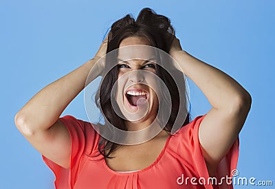 Crazed and Frustrated Woman pulling her hair