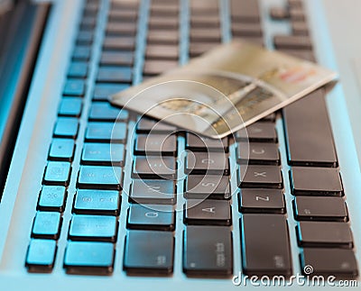 Credit card on computer keyboard