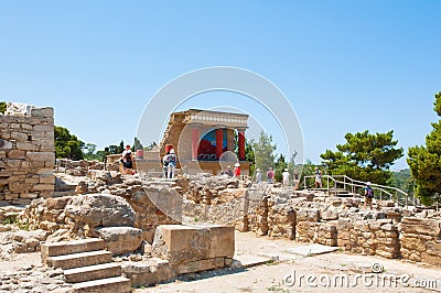 CRETE,GREECE-JULY 21: Tourists at the Knossos palace on July 21,2014 on the Crete island in Greece. Knossos palace is the largest