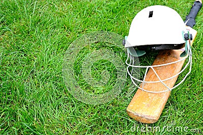 Cricket bat and helmet