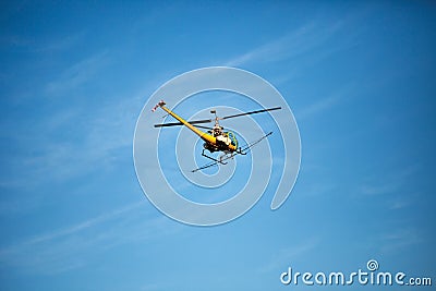 Crop sprayer duster helicopter, spraying mountains, fields and l