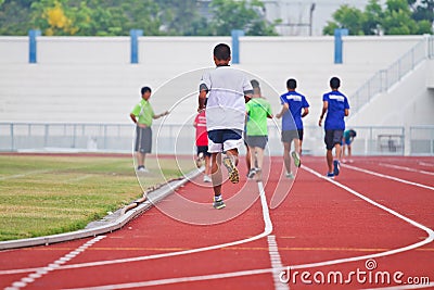 Cropped image of runner on competitive running