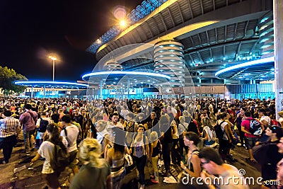 Crowd of people outside San Siro football stadium in Milan, Italy