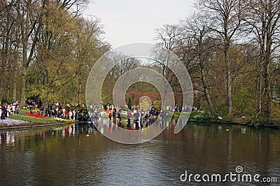 Crowd of people in park.