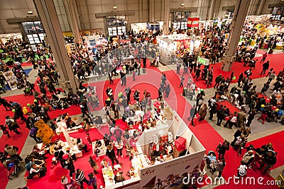 Crowded panoramic view of an indoor exhibition