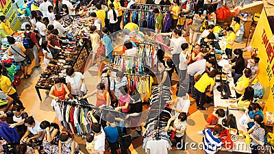 Crowded shoping centre, sale off season