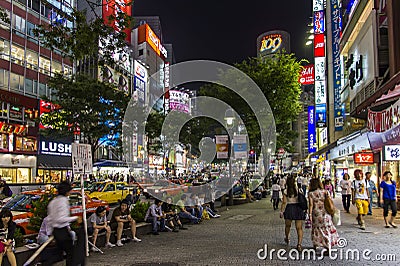 Crowds of people in Shibuya district in Tokyo, Japan.