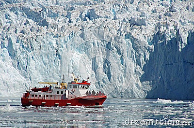 Cruise boat among the icebergs, Greenland