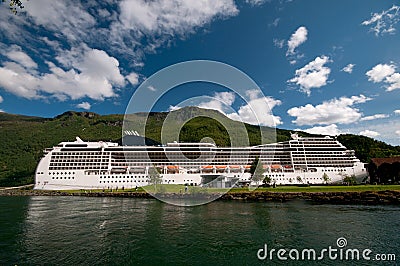 Cruise ship at Flåm harbour & train station Sognefjord/ Sognefjorden, Norway