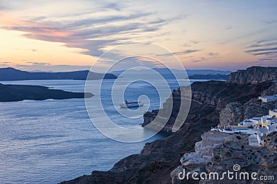 Cruise Ship in Santorini Greece around sunset