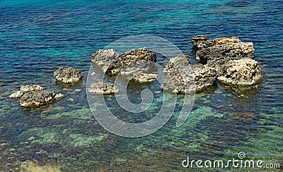 Crystal water in mediterranean sea,turquoise water on summertime in Malta,crystal sea and rocks, maltese nature