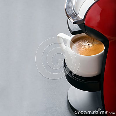 Cup of espresso in the coffee machine and space for your text