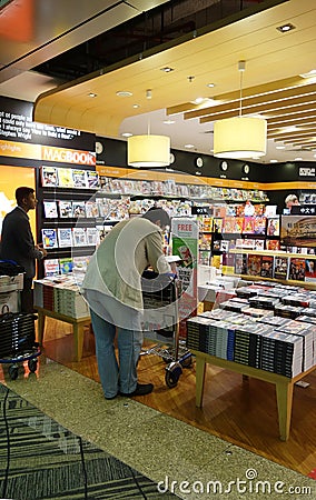 Customers shop for books in Changi Airport, Singapore